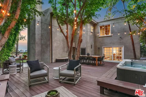 a view of a roof deck with couches