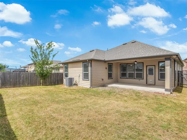 a house with a yard in front of it