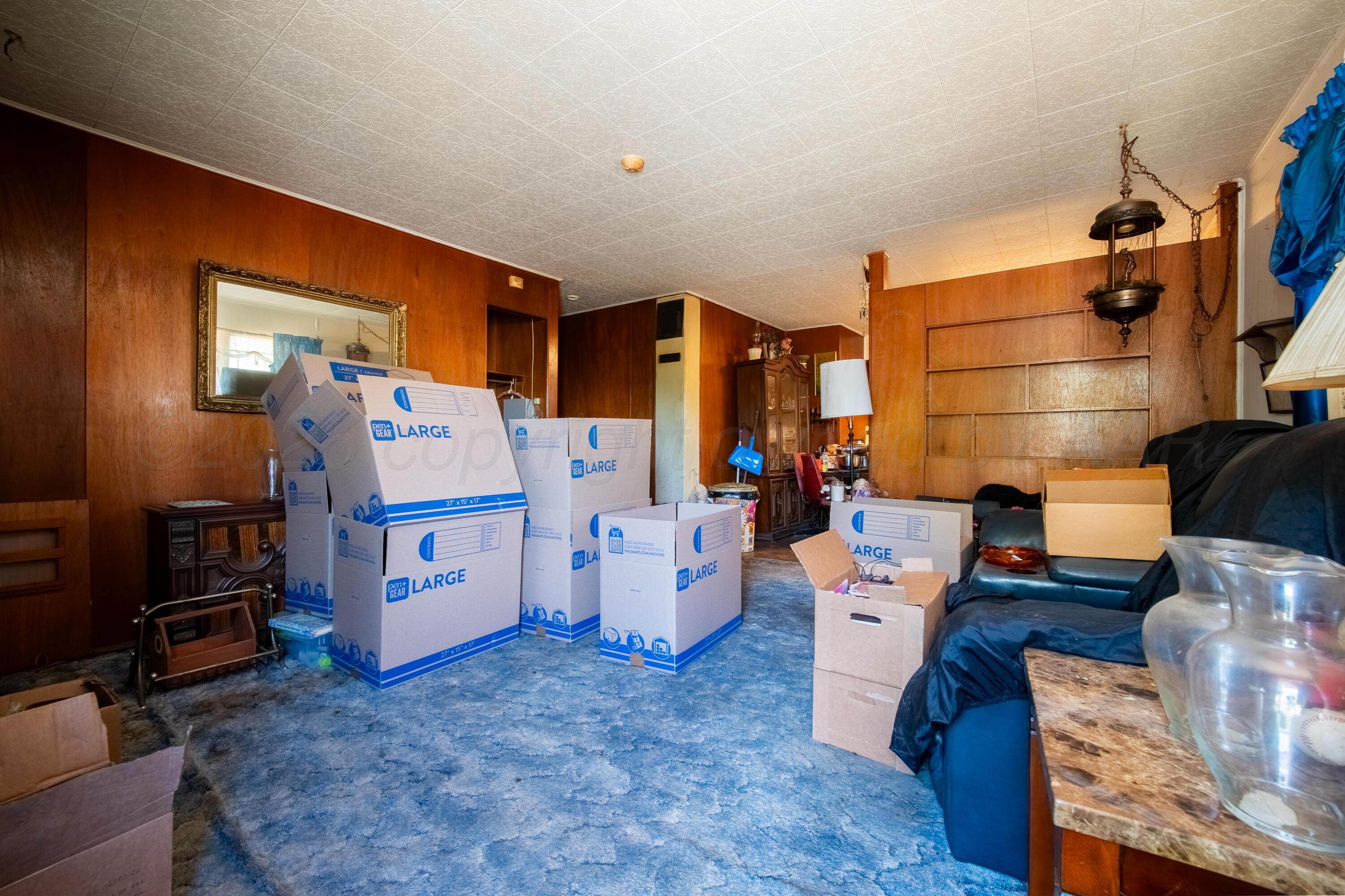 3007 Walnut Street Amarillo, TX 79107 - Photo 15 of 21 a room with furniture and a flat screen tv