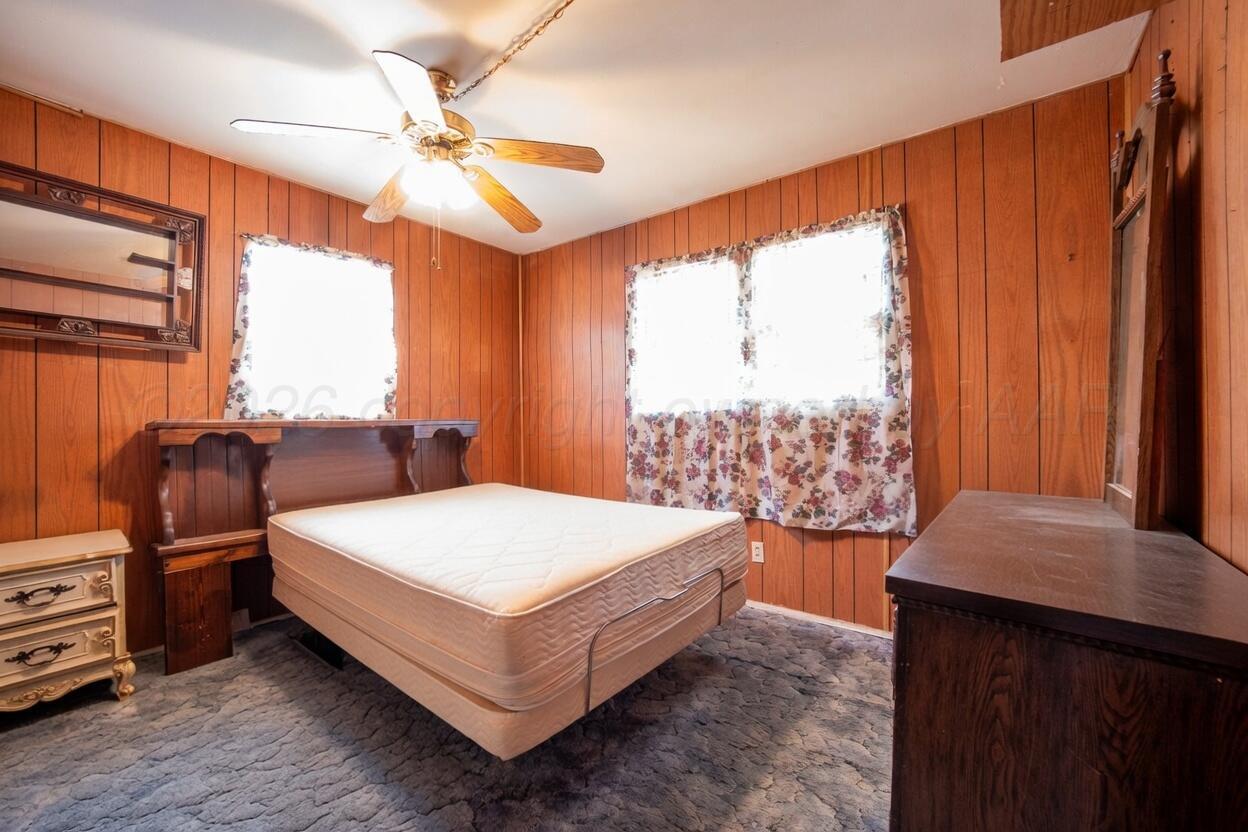 3007 Walnut Street Amarillo, TX 79107 - Photo 6 of 21 a bedroom with a bed and window