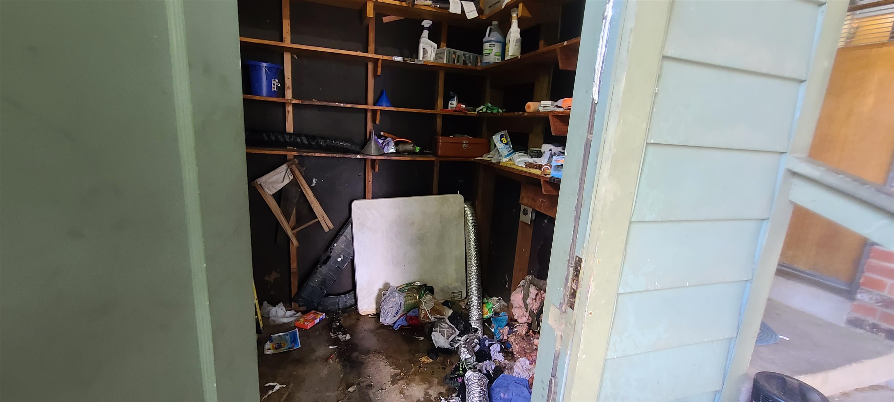 5569 Milam Road Memphis, TN 38120 - Photo 10 of 37 a view of walk in closet with clothes and shoes