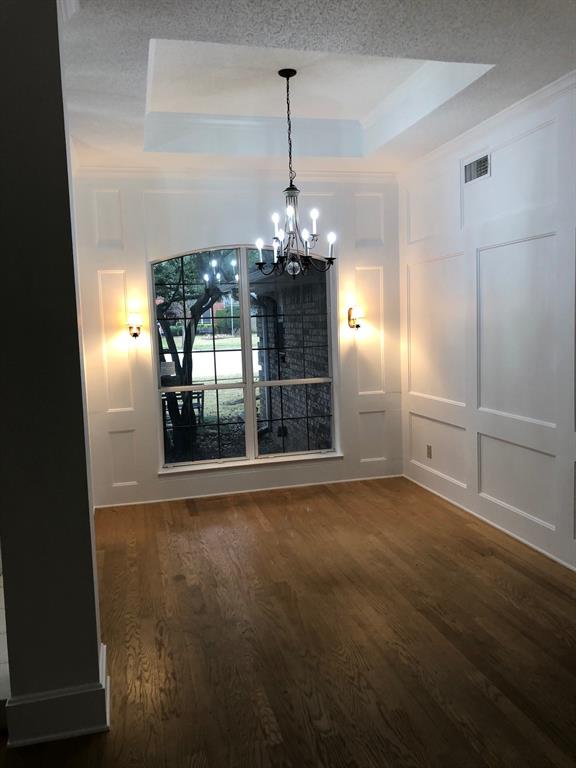 5311 Altacrest Court Grapevine, TX 76051 - Photo 2 of 11 a view of a room with window and wooden floor