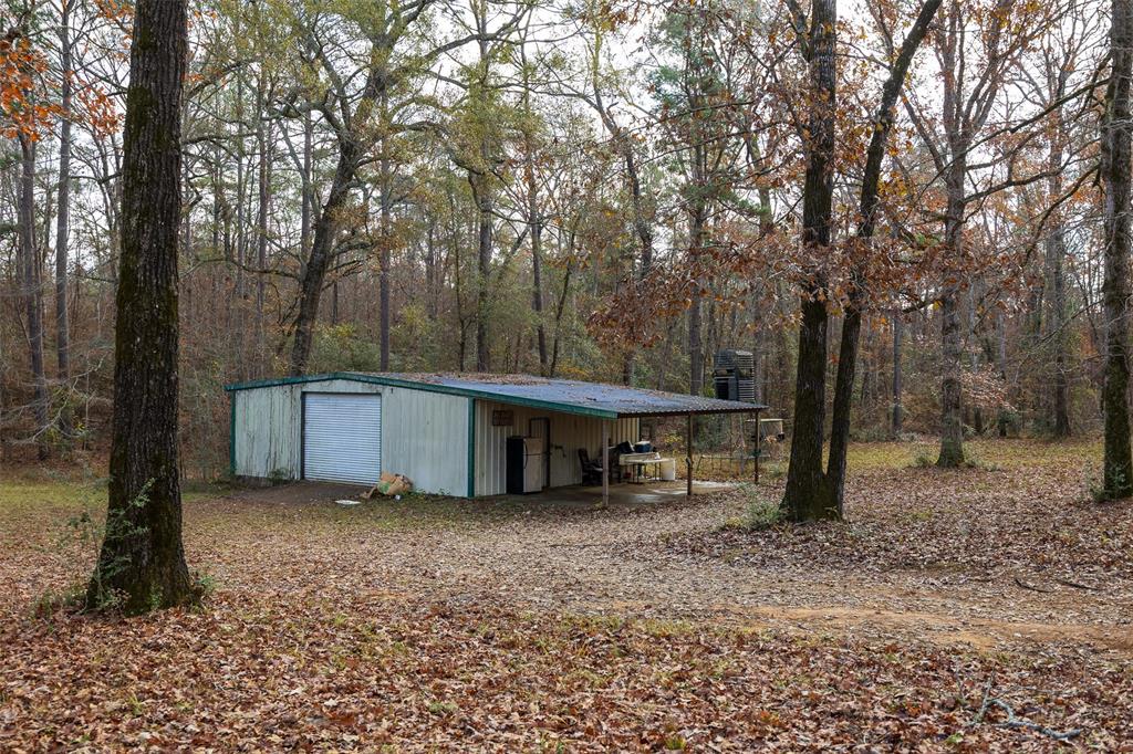 0 County Road 511 Kennard, TX 75847 - Photo 13 of 40 a view of a house with a trees