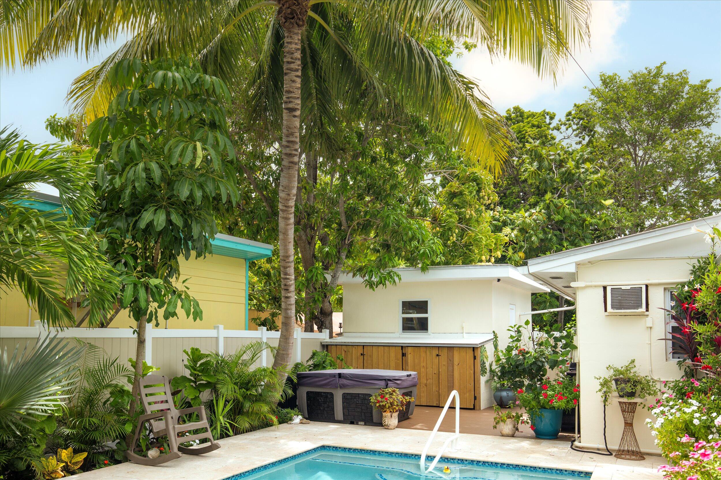 1320 6th Street Key West, FL 33040 - Photo 14 of 61 a view of house with a yard and swimming pool
