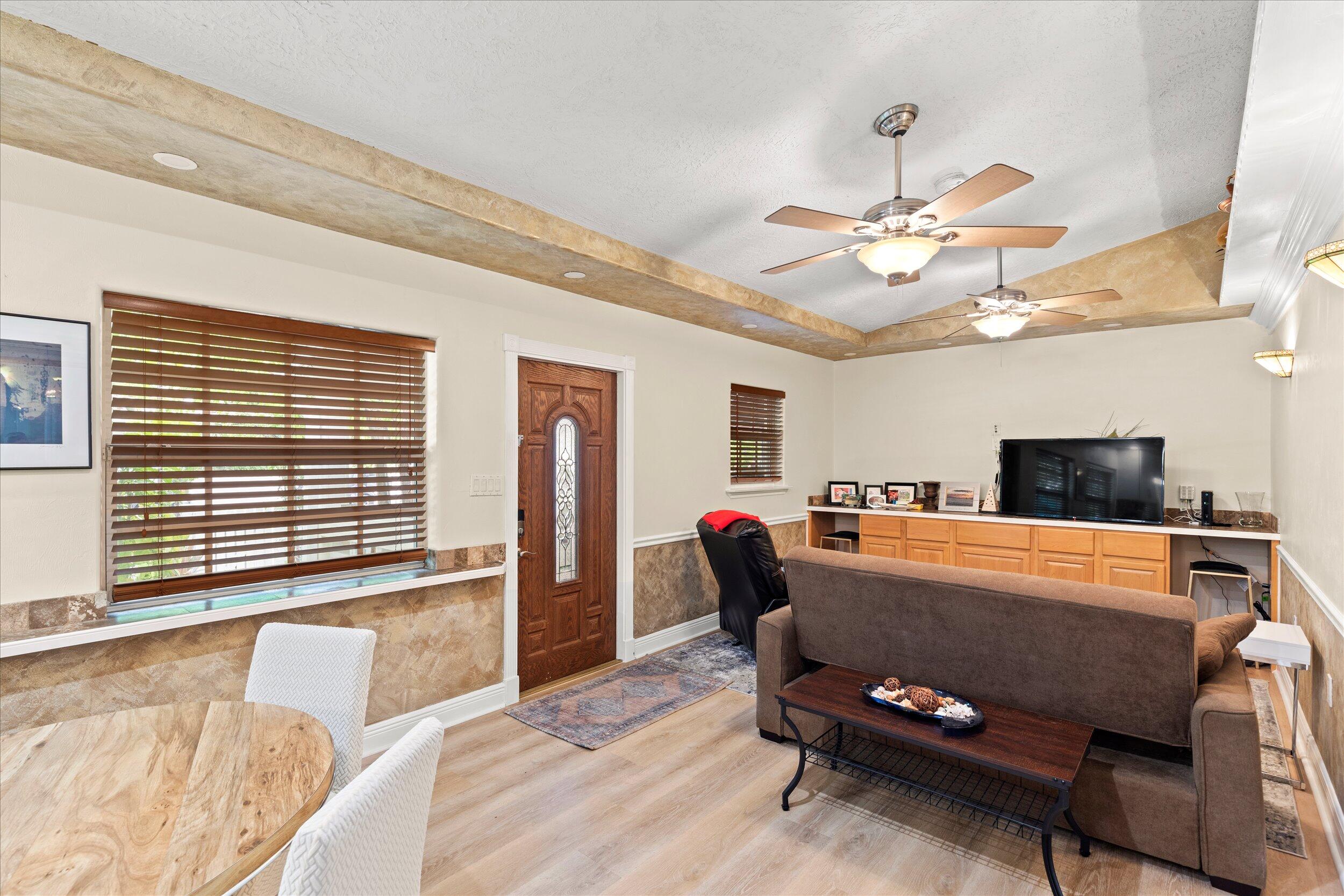 1320 6th Street Key West, FL 33040 - Photo 18 of 61 a living room with furniture and a flat screen tv