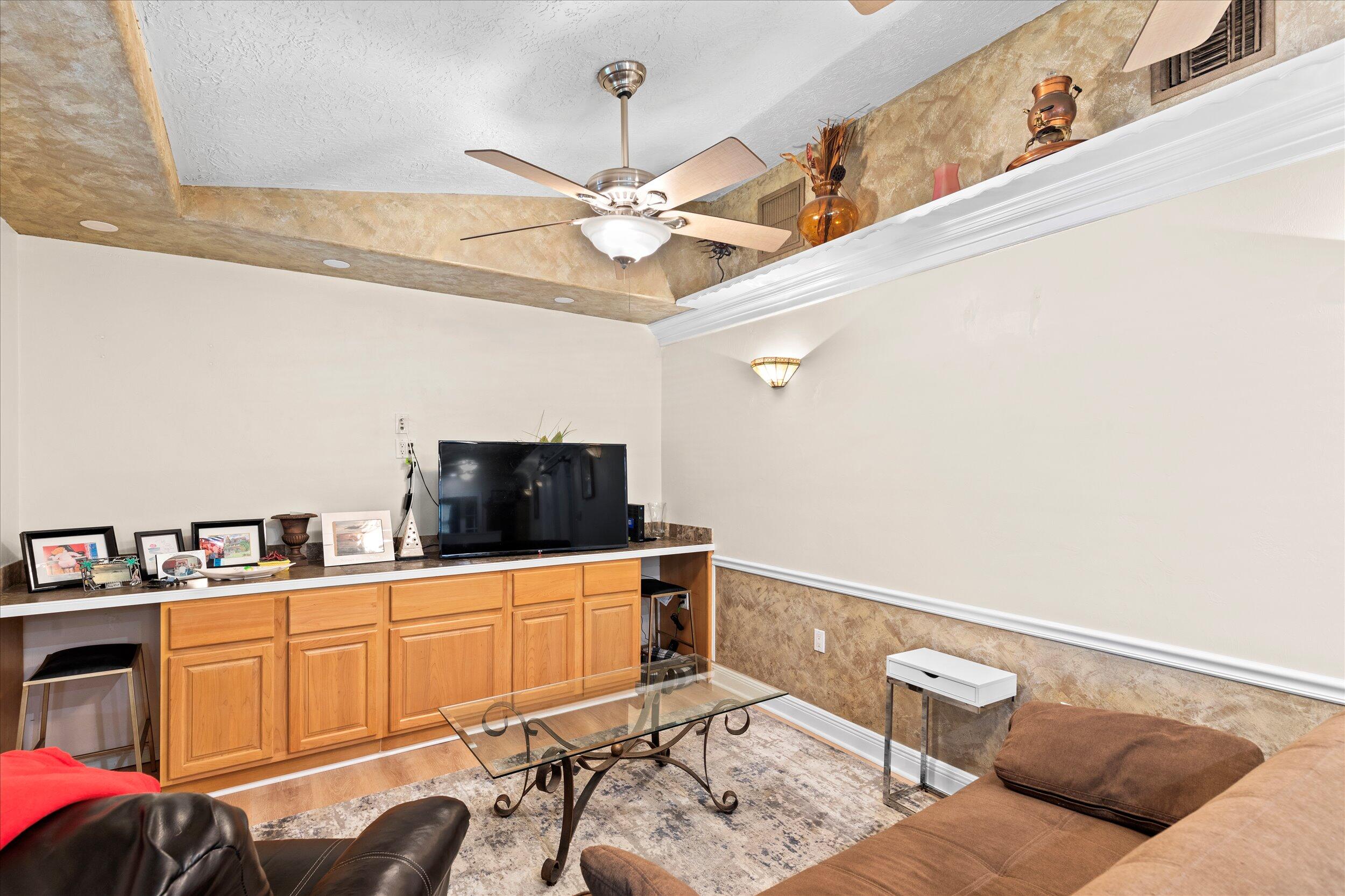 1320 6th Street Key West, FL 33040 - Photo 19 of 61 a living room with furniture and a flat screen tv
