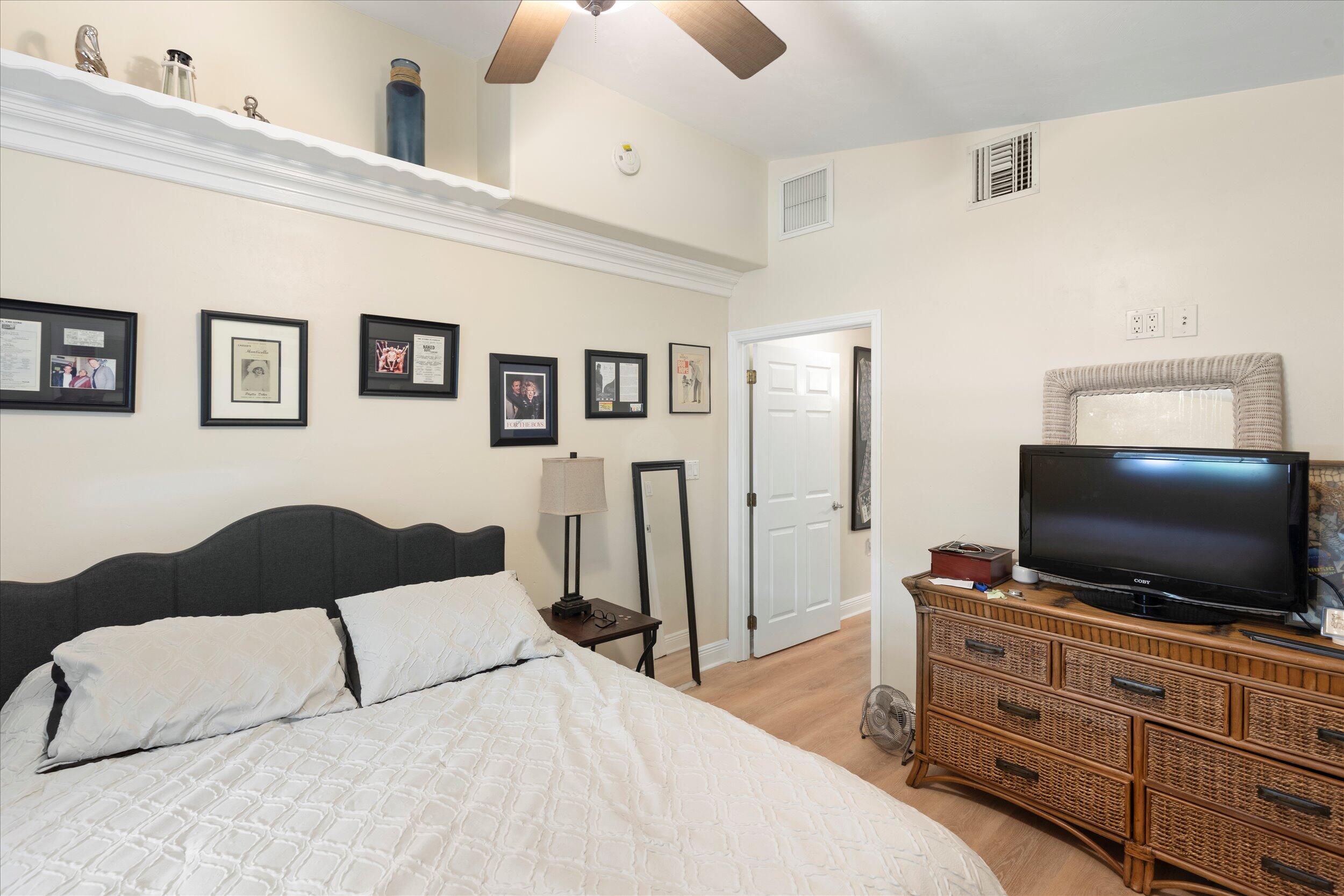 1320 6th Street Key West, FL 33040 - Photo 36 of 61 a bedroom with a bed and a flat screen tv