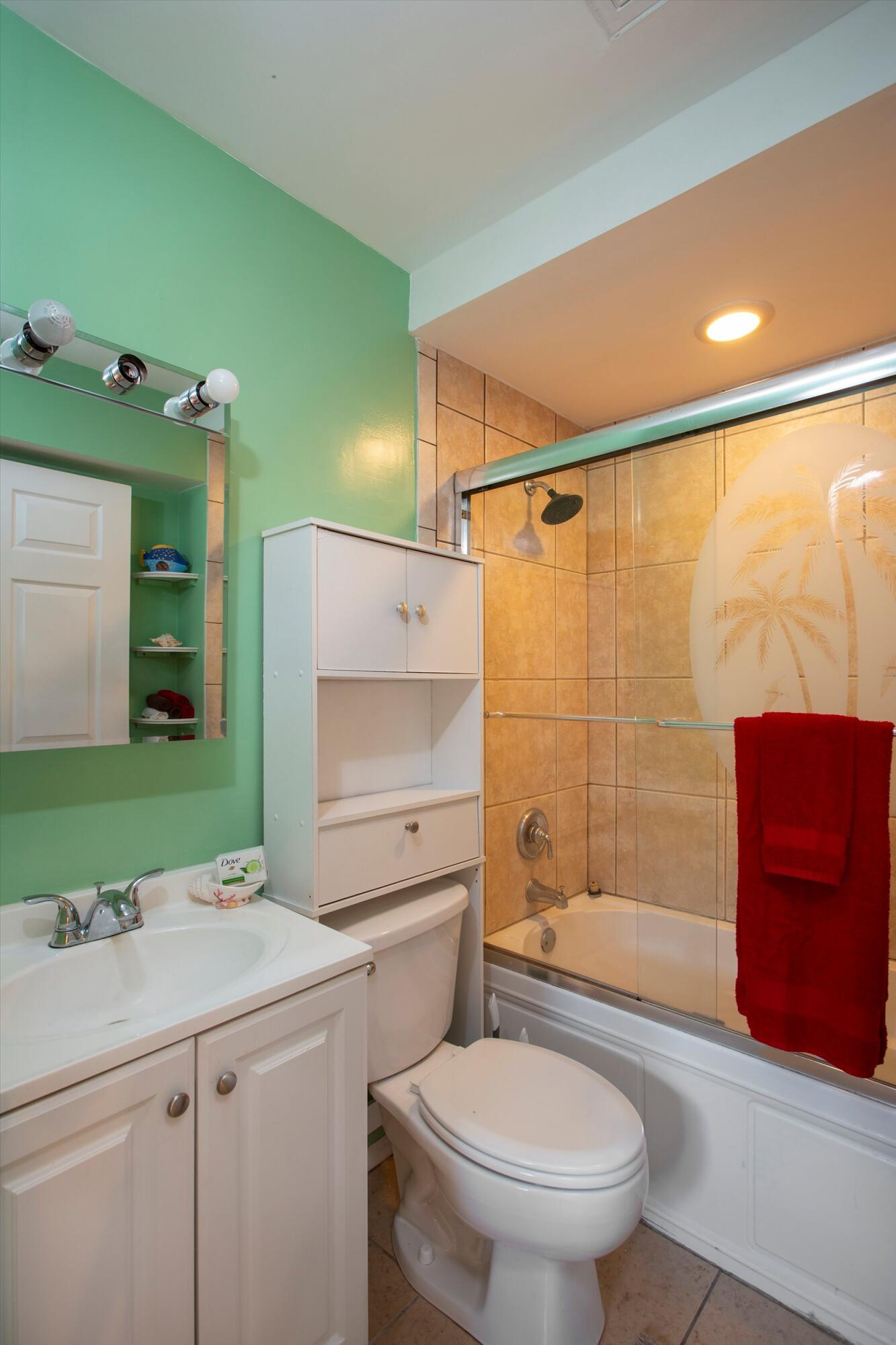 1320 6th Street Key West, FL 33040 - Photo 49 of 61 a bathroom with a sink a toilet and shower