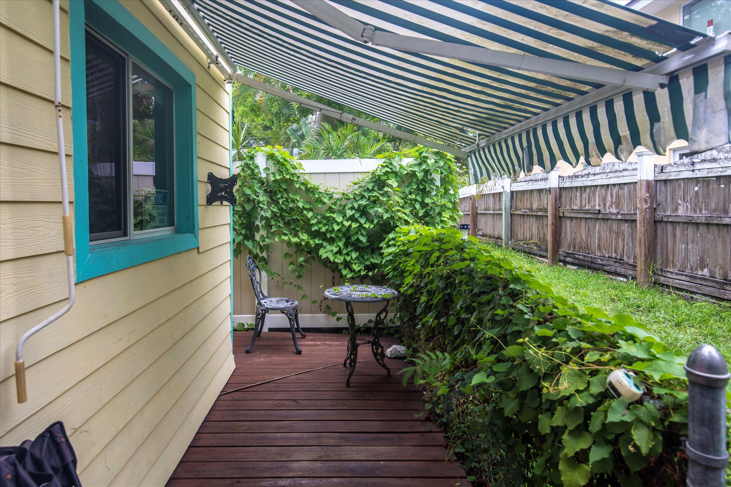 1320 6th Street Key West, FL 33040 - Photo 50 of 61 a view of a backyard with sitting area