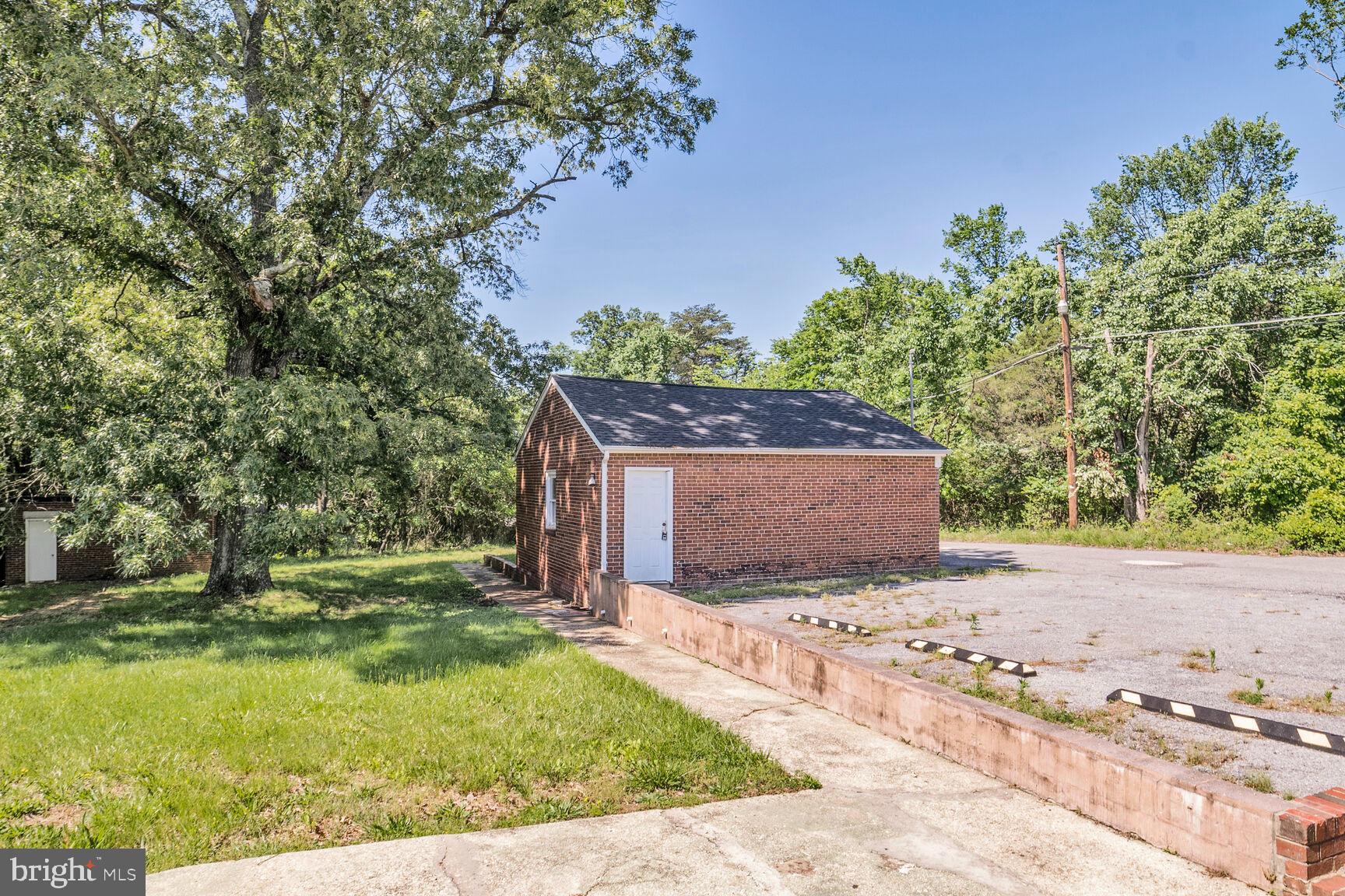 4515 Old Branch Avenue Temple Hills, MD 20748 - Photo 11 of 21 a front view of a house with a yard