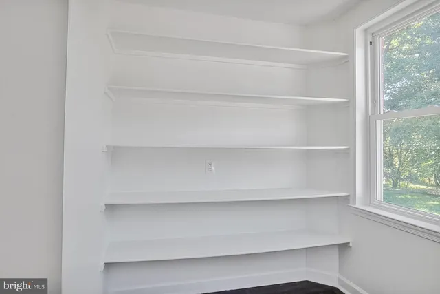 a view of a closet with window