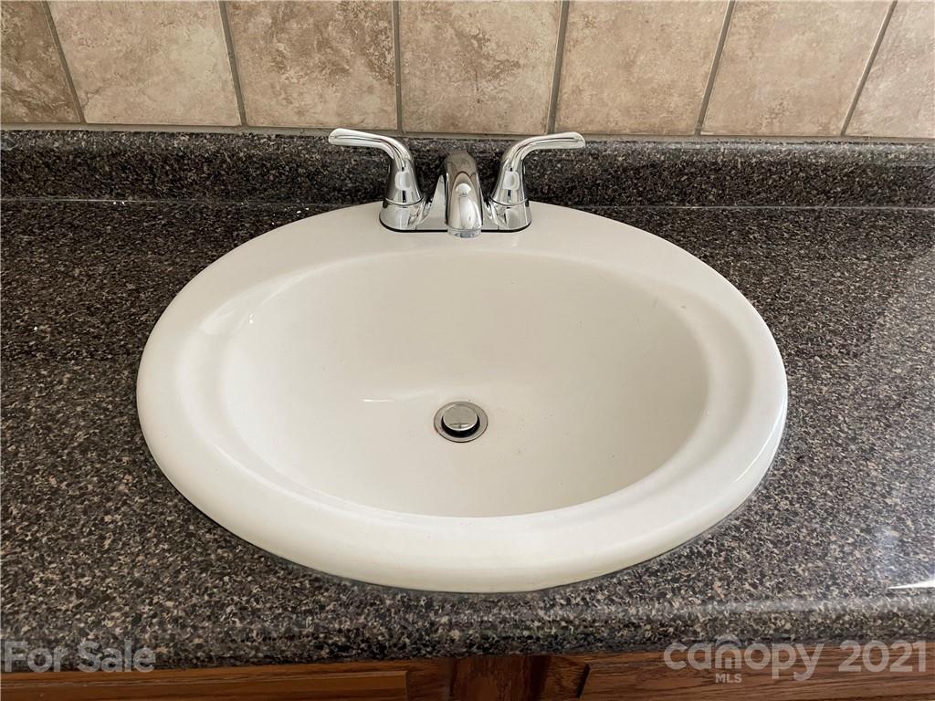 4794 Blade Run Road Edgemoor, SC 29712 - Photo 14 of 20 a view of a sink in a bathroom