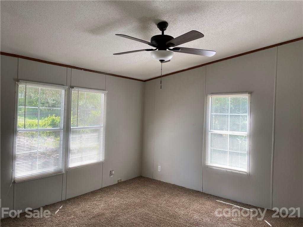4794 Blade Run Road Edgemoor, SC 29712 - Photo 18 of 20 a view of an empty room with a window