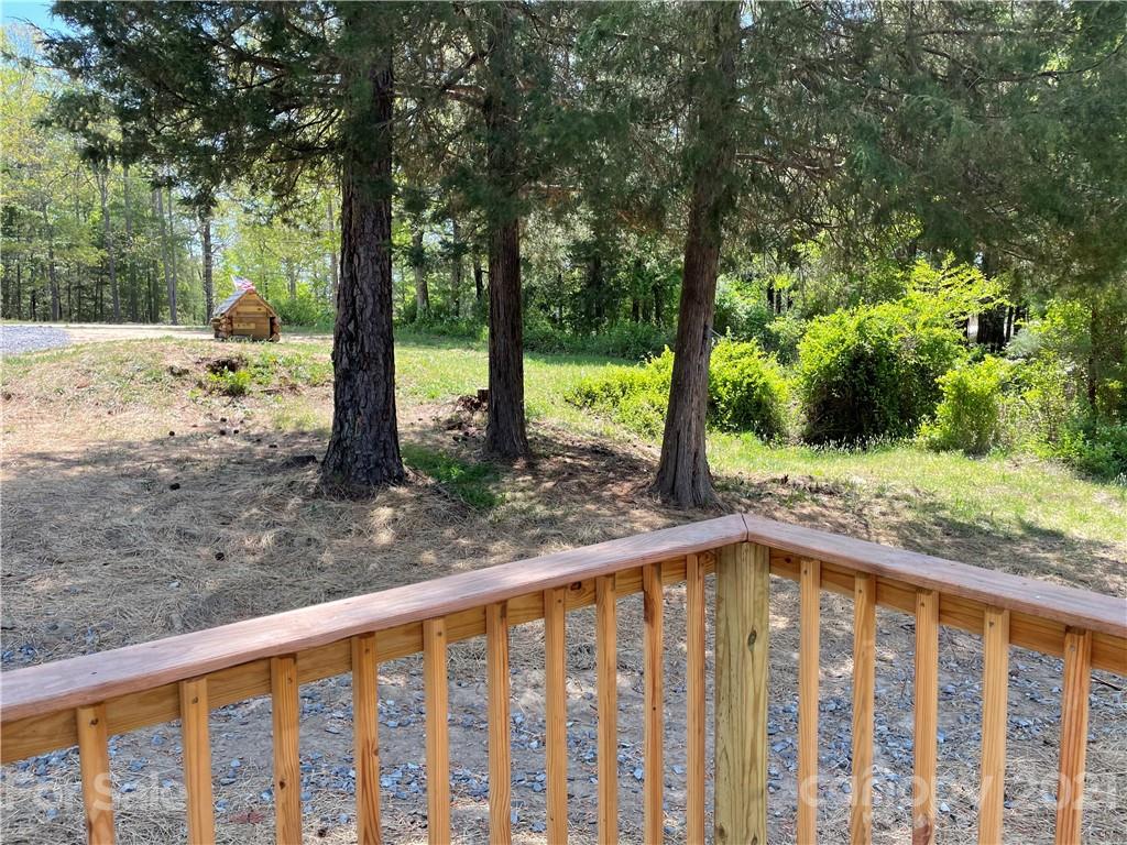 4794 Blade Run Road Edgemoor, SC 29712 - Photo 7 of 20 a view of a yard with wooden fence