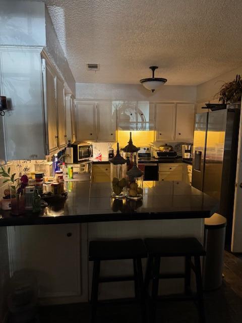4806 76th Street Lubbock, TX 79424 - Photo 3 of 11 a view of a dining room with furniture