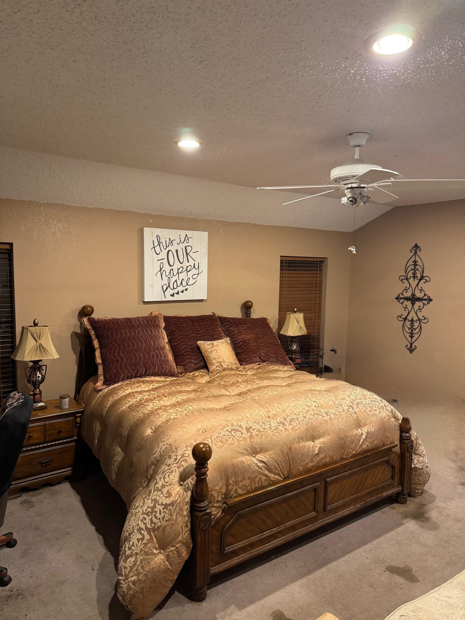 4806 76th Street Lubbock, TX 79424 - Photo 8 of 11 a bedroom with bed and window