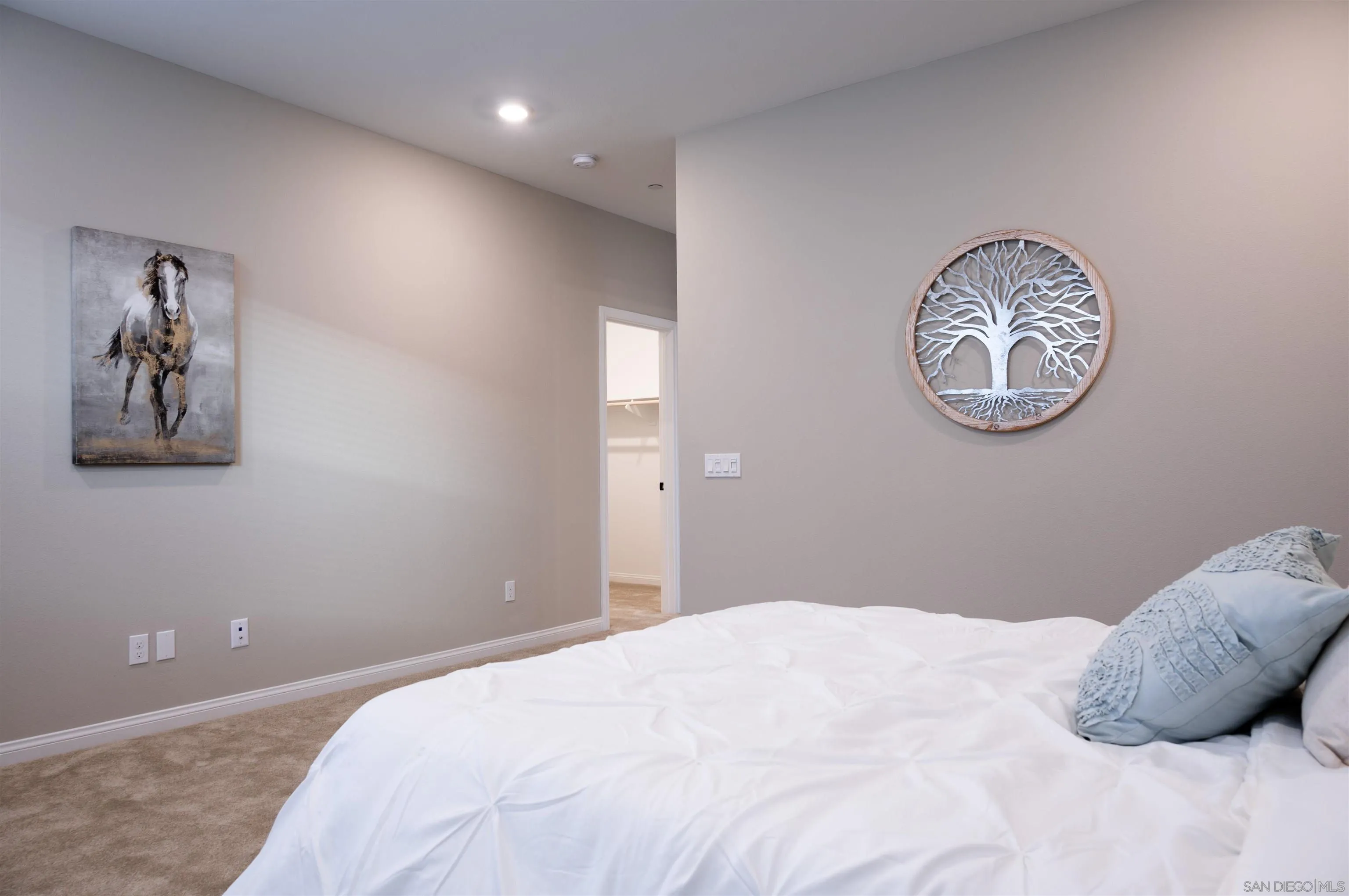 1790 Whitmore Loop Chula Vista, CA 91913 - Photo 11 of 28 a bedroom with a bed and a wall painting