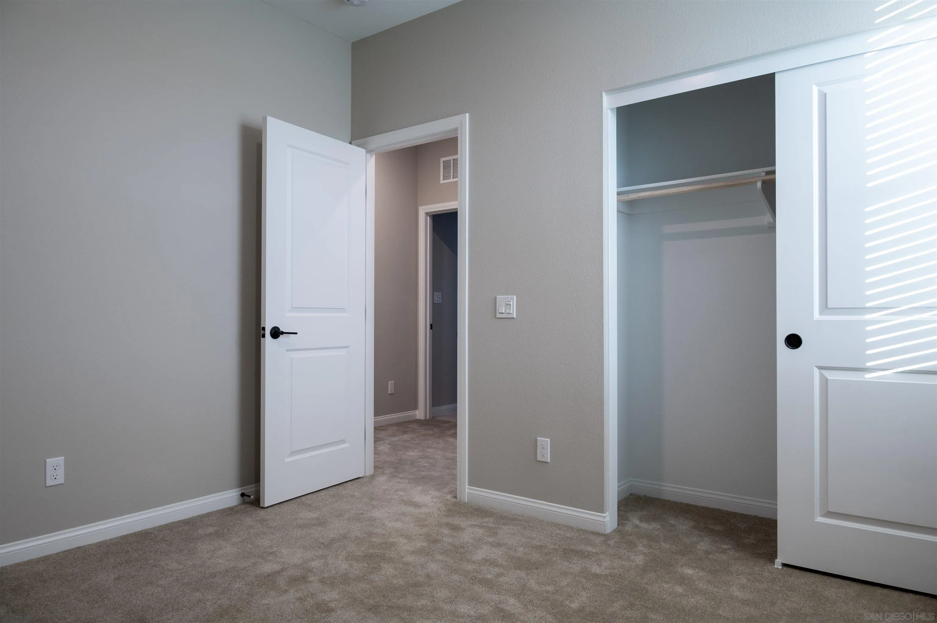 1790 Whitmore Loop Chula Vista, CA 91913 - Photo 17 of 28 an empty room that has a grey walls