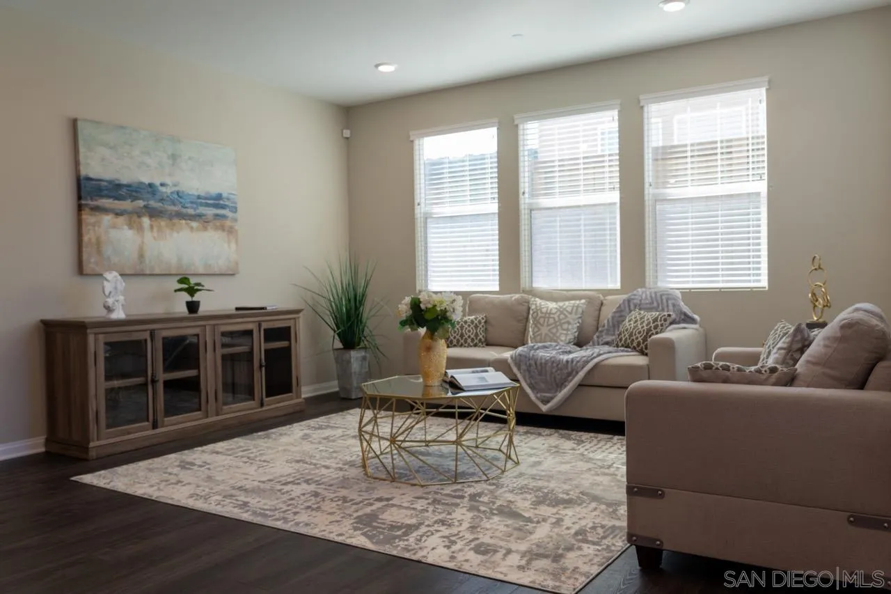 1790 Whitmore Loop Chula Vista, CA 91913 - Photo 7 of 28 a living room with furniture and a table