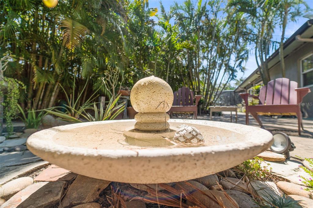 2814 47th Street South Gulfport, FL 33711 - Photo 27 of 57 a view of a fountain in the backyard of house
