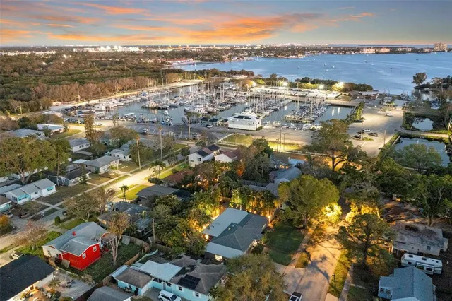 a pathway of a house with a yard