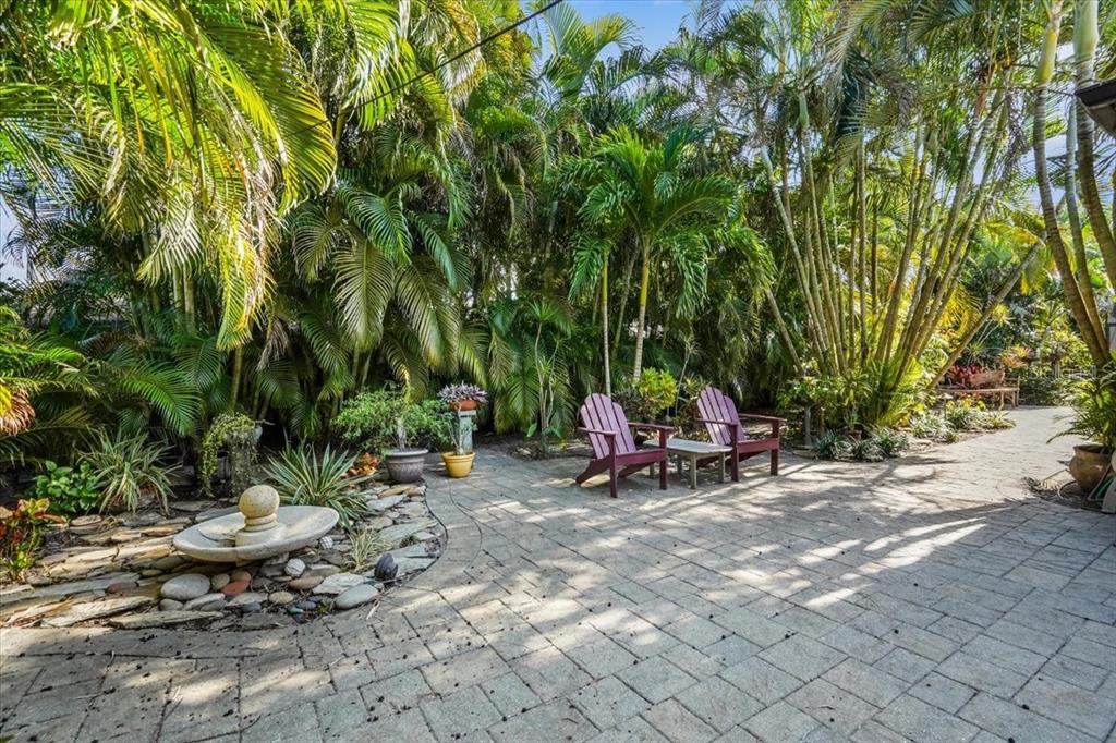 2814 47th Street South Gulfport, FL 33711 - Photo 34 of 57 a view of a chair and table in backyard