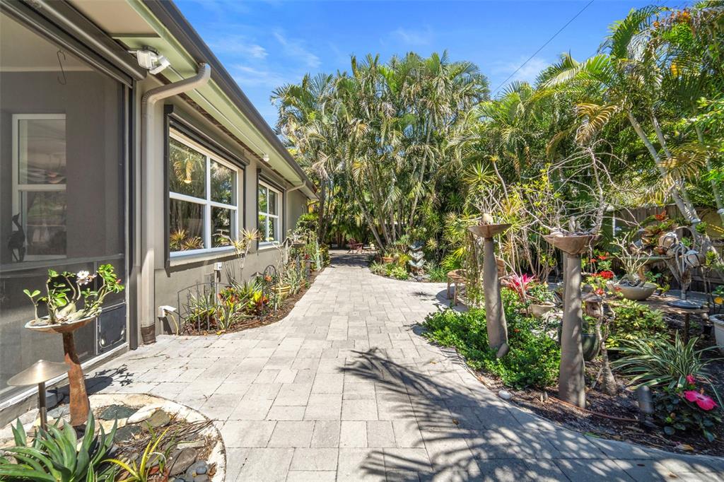 2814 47th Street South Gulfport, FL 33711 - Photo 35 of 57 a pathway of a house with a yard