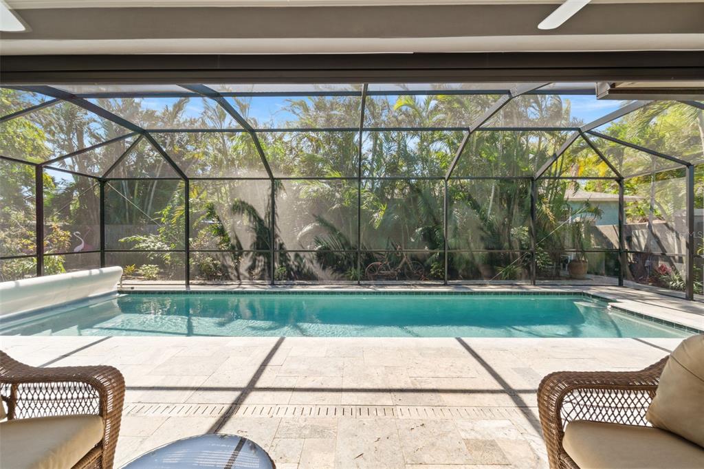 2814 47th Street South Gulfport, FL 33711 - Photo 5 of 57 a white bench sitting in front of a house