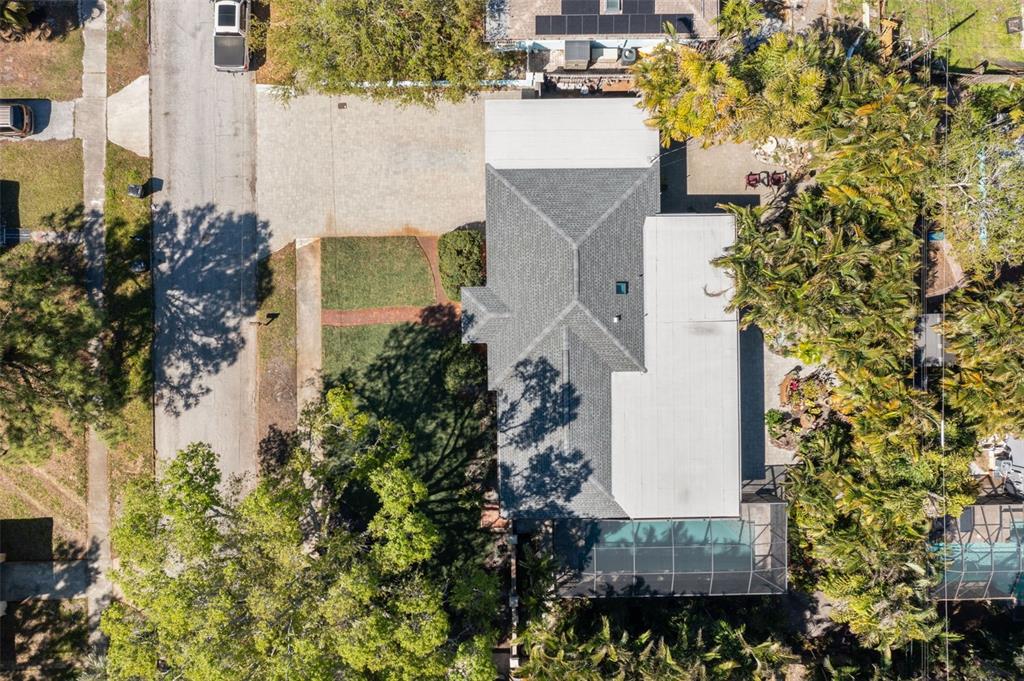 2814 47th Street South Gulfport, FL 33711 - Photo 54 of 57 an aerial view of a house with a yard and garden
