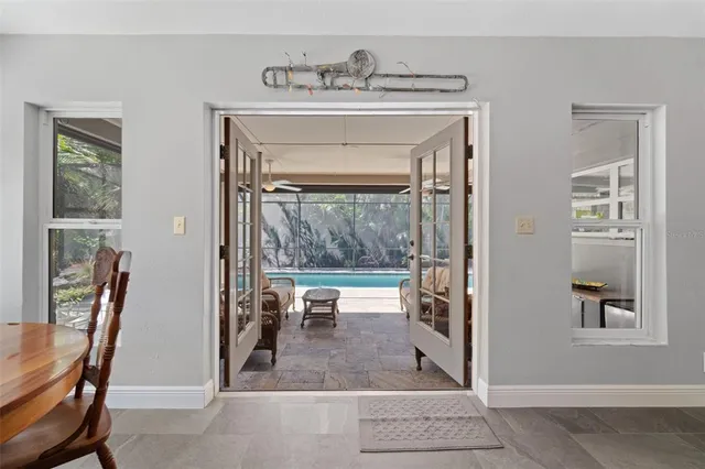 a view of a hallway with seating area