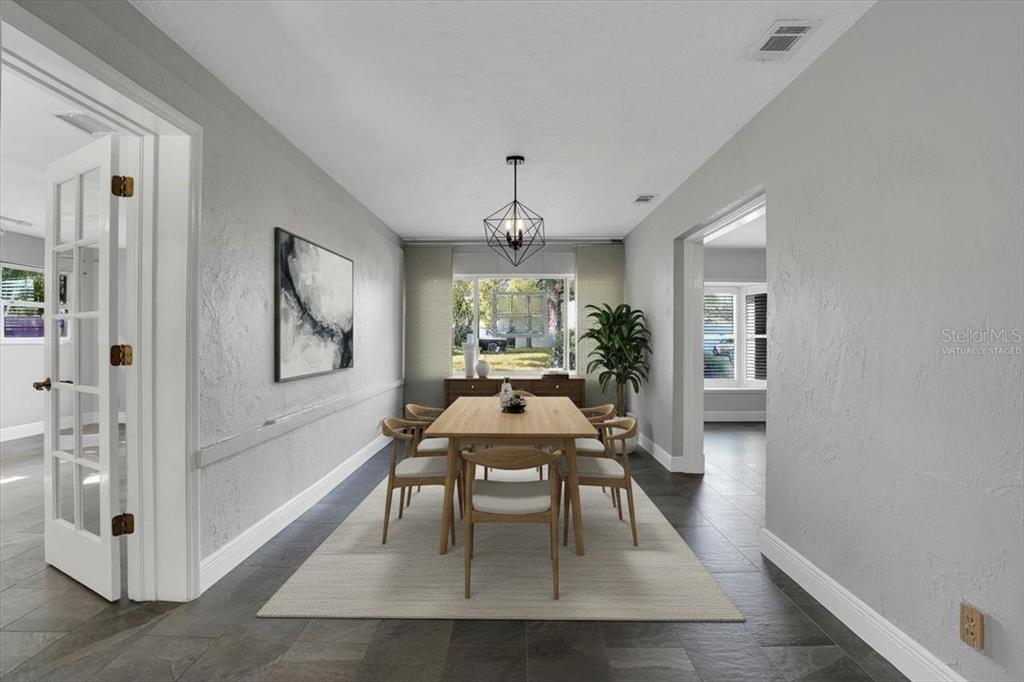 2814 47th Street South Gulfport, FL 33711 - Photo 10 of 57 a dining room with furniture and window