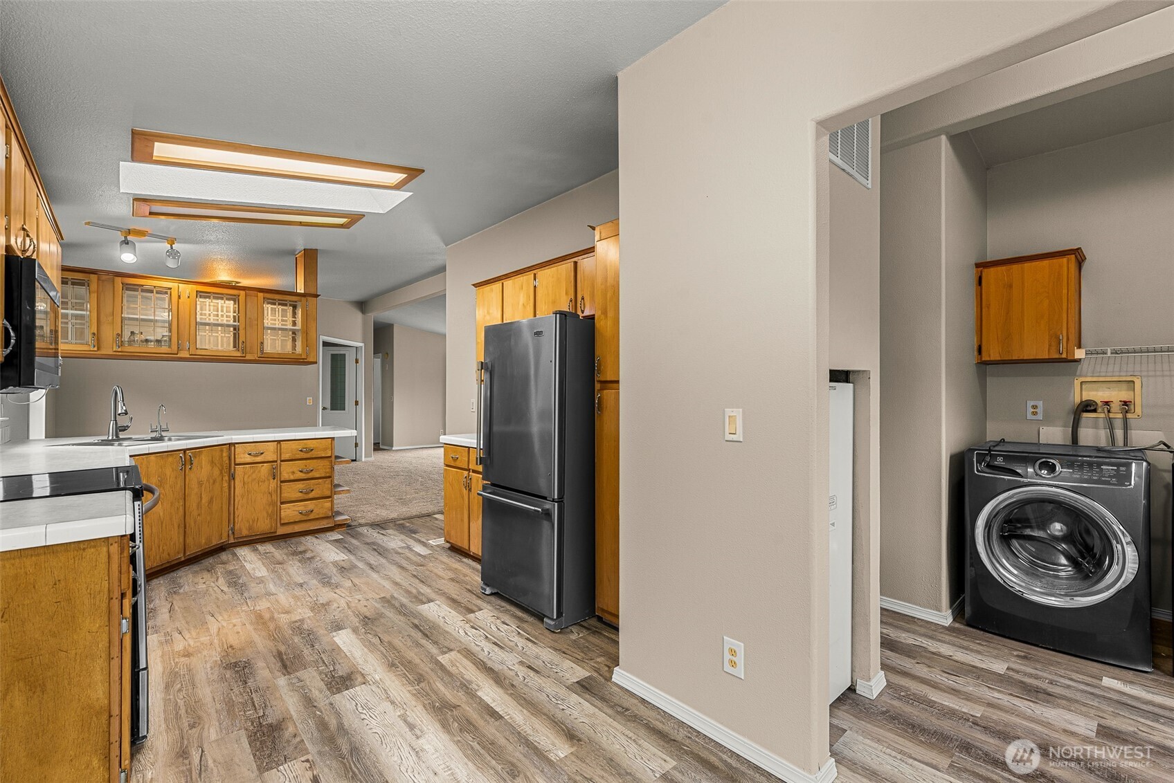 3570 Pinnacle Place Wenatchee, WA 98801 - Photo 11 of 35 a view of a kitchen with a sink washer and dryer