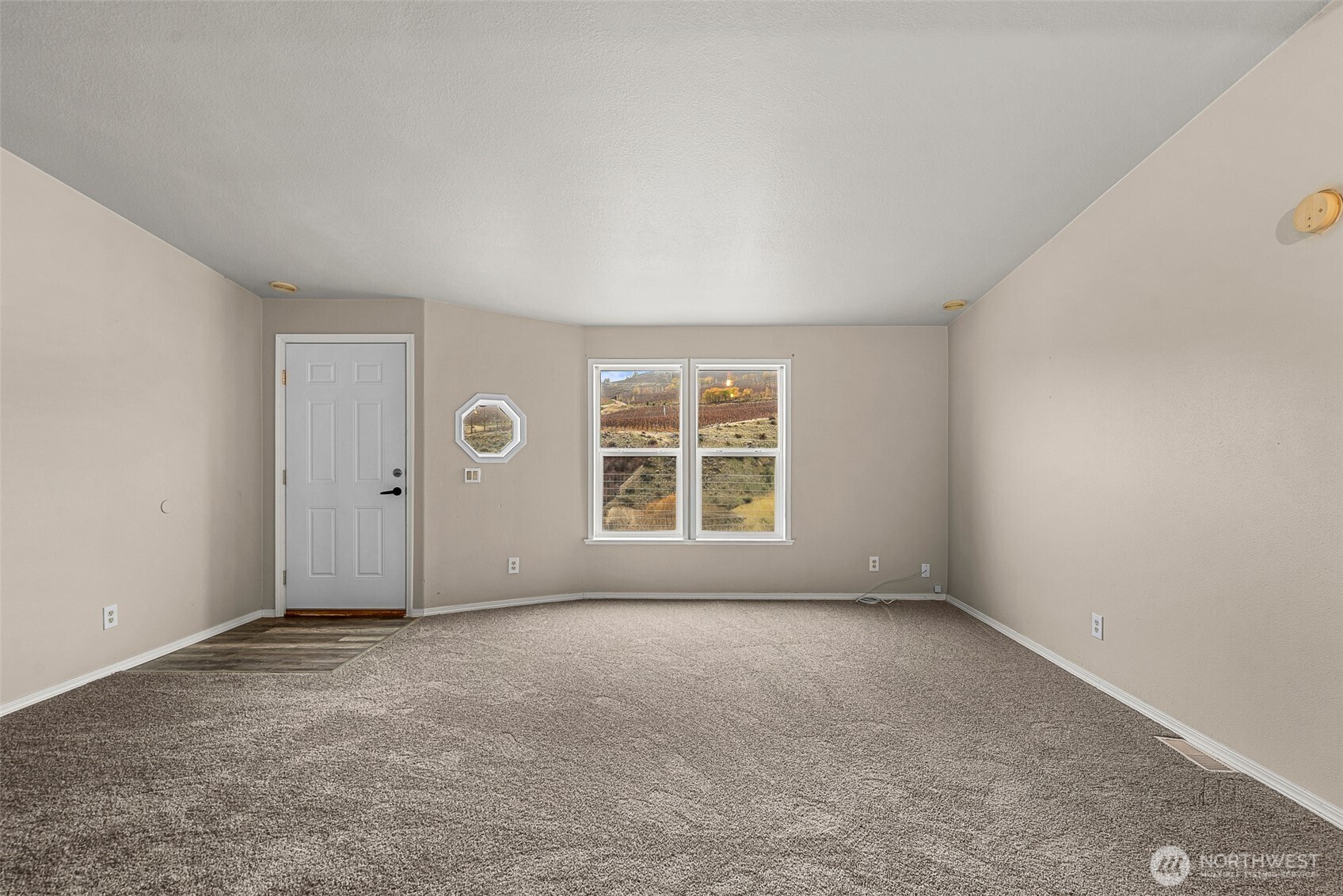 3570 Pinnacle Place Wenatchee, WA 98801 - Photo 16 of 35 a view of an empty room with a window