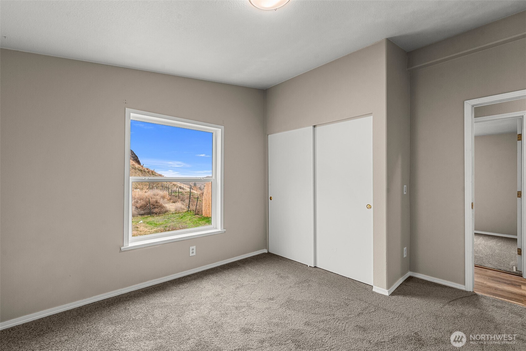 3570 Pinnacle Place Wenatchee, WA 98801 - Photo 27 of 35 an empty room with windows