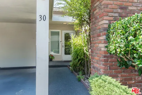 a view of a back yard of the house