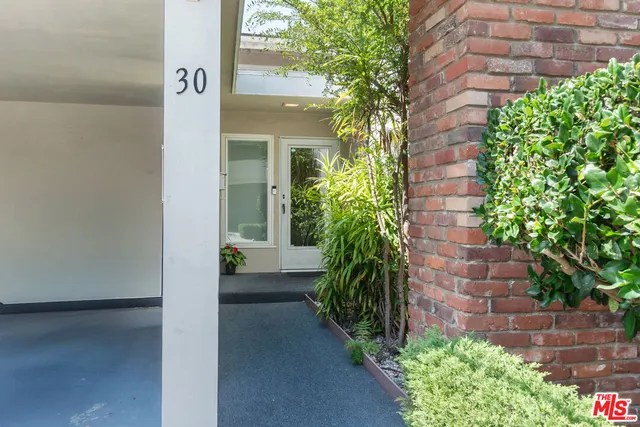 a view of a back yard of the house