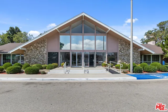 swimming pool view with a outdoor space