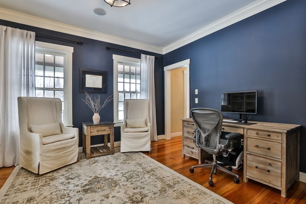 339 Stow Road Harvard, MA 01451 - Photo 20 of 40 a view of a livingroom with workspace and a window