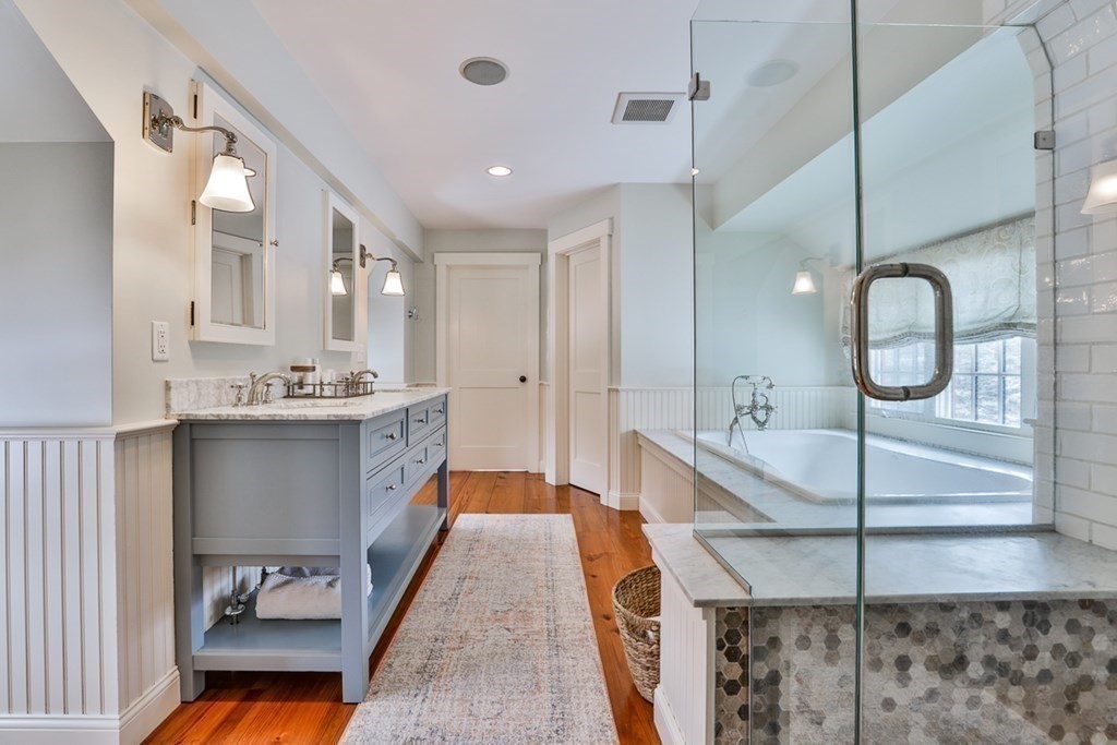 339 Stow Road Harvard, MA 01451 - Photo 31 of 40 a large bathroom with a double vanity sink and a mirror