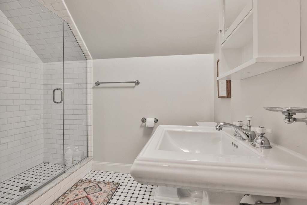339 Stow Road Harvard, MA 01451 - Photo 35 of 40 a bathroom with a sink and shower