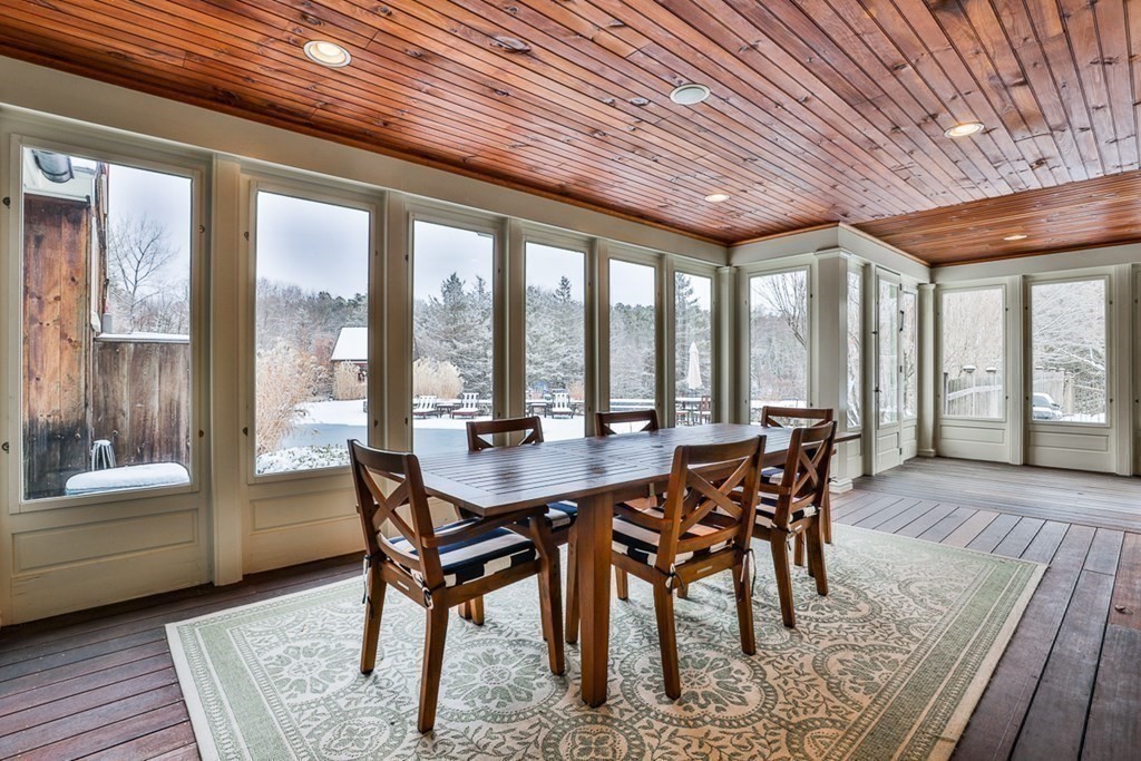 339 Stow Road Harvard, MA 01451 - Photo 37 of 40 a view of a dining room with furniture window and wooden floor