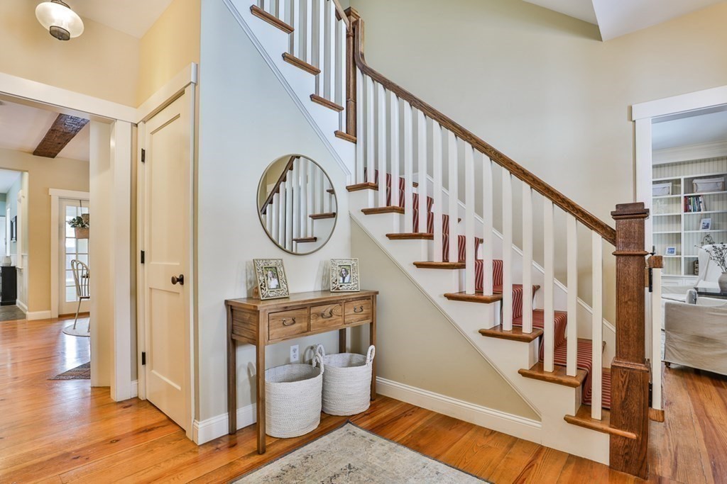 339 Stow Road Harvard, MA 01451 - Photo 5 of 40 a view of entryway and hall with wooden floor