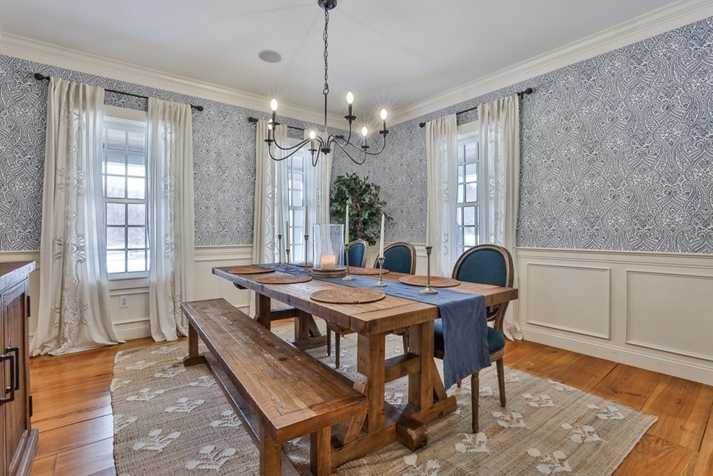 339 Stow Road Harvard, MA 01451 - Photo 6 of 40 a view of a dining room with furniture and window