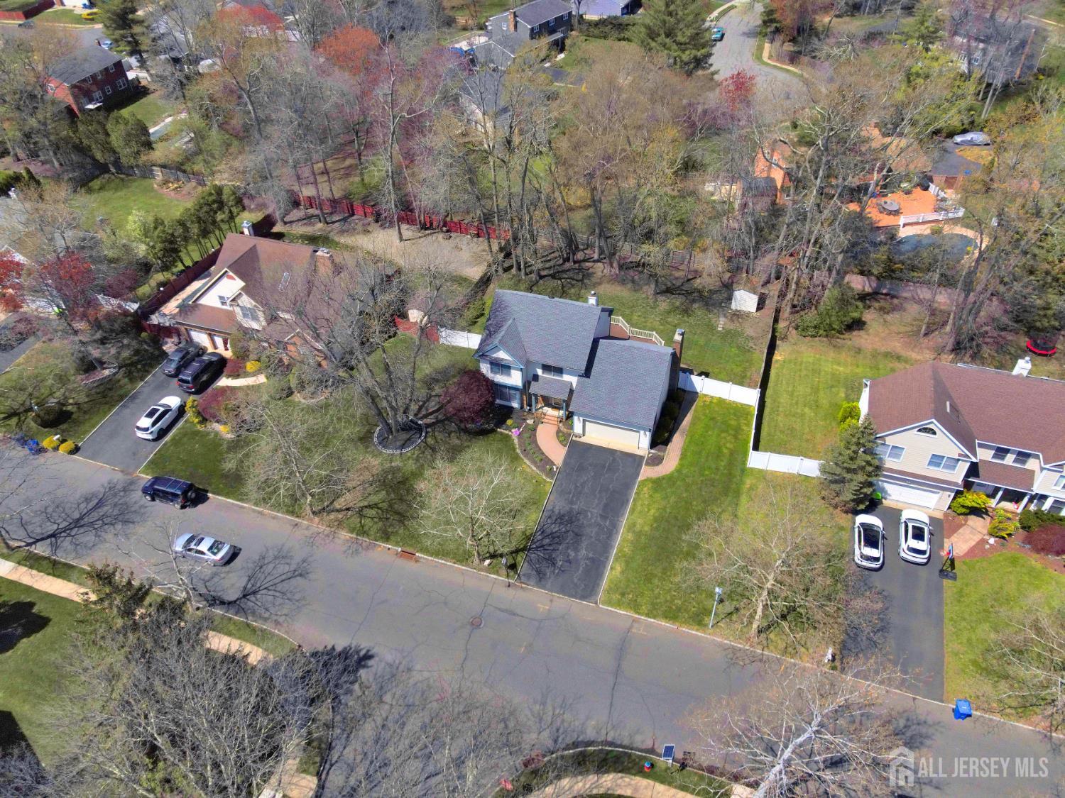 27 Oakland Road Old Bridge, NJ 08857 - Photo 13 of 39 an aerial view of a house with a yard