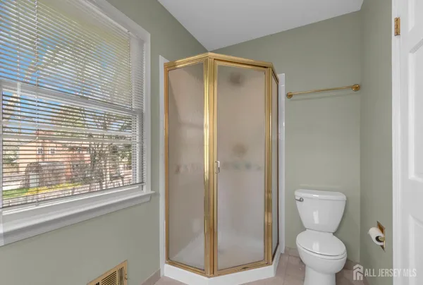 an aerial view of a house with a yard basket ball court and outdoor seating