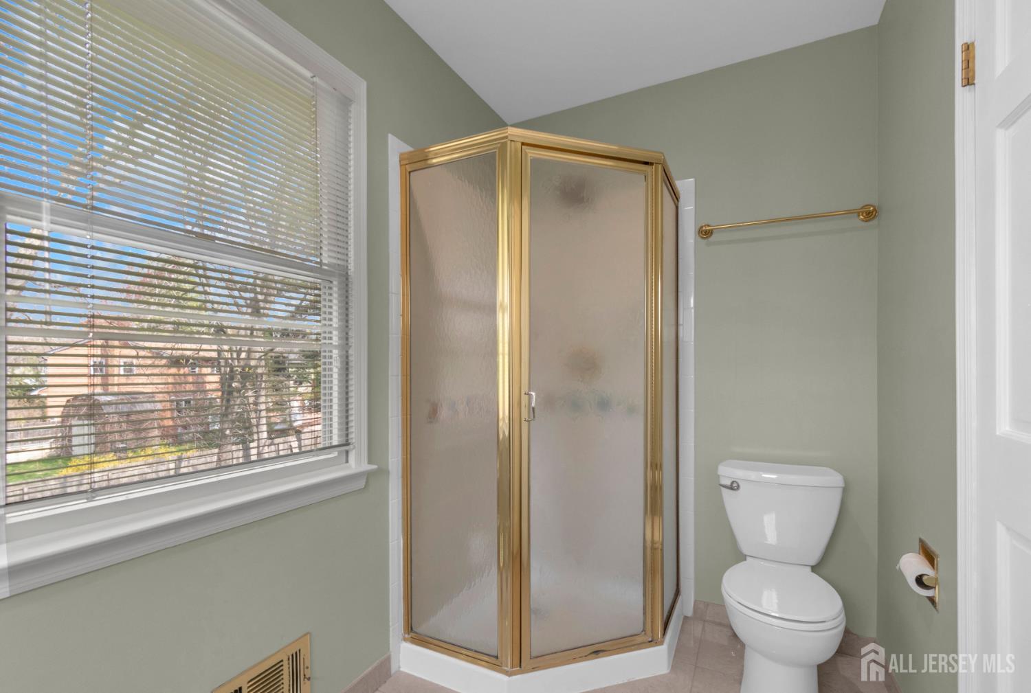 27 Oakland Road Old Bridge, NJ 08857 - Photo 16 of 39 a bathroom with a toilet and a shower