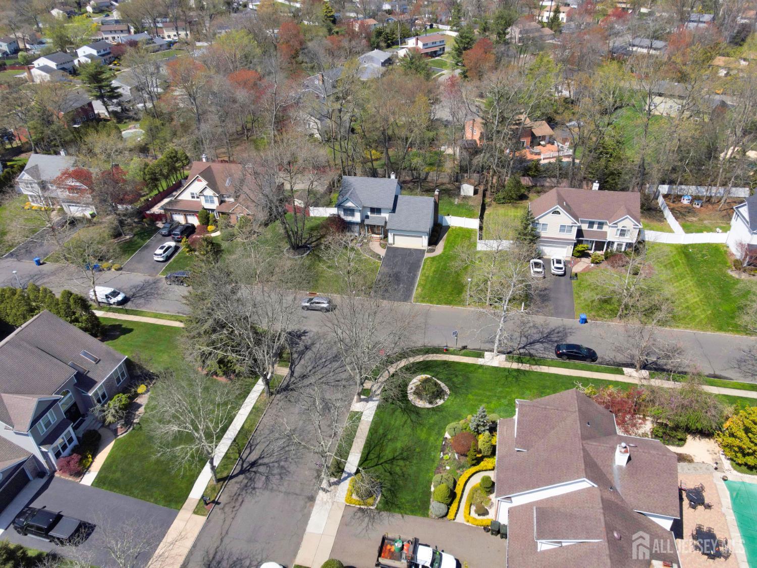 27 Oakland Road Old Bridge, NJ 08857 - Photo 26 of 39 an aerial view of a house with a yard basket ball court and outdoor seating