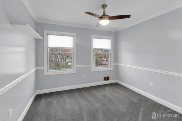a view of a kitchen with a sink and a window