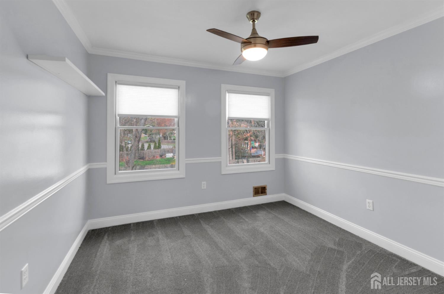 27 Oakland Road Old Bridge, NJ 08857 - Photo 29 of 39 wooden floor in an empty room with a window