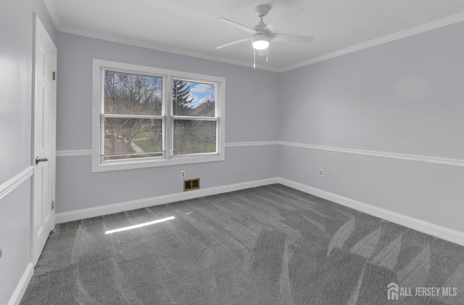 27 Oakland Road Old Bridge, NJ 08857 - Photo 30 of 39 an empty room with a window